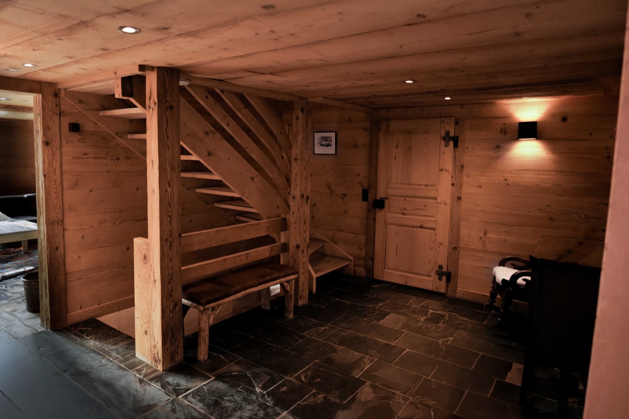 Entry hall with original timber staircase and slate stone floor